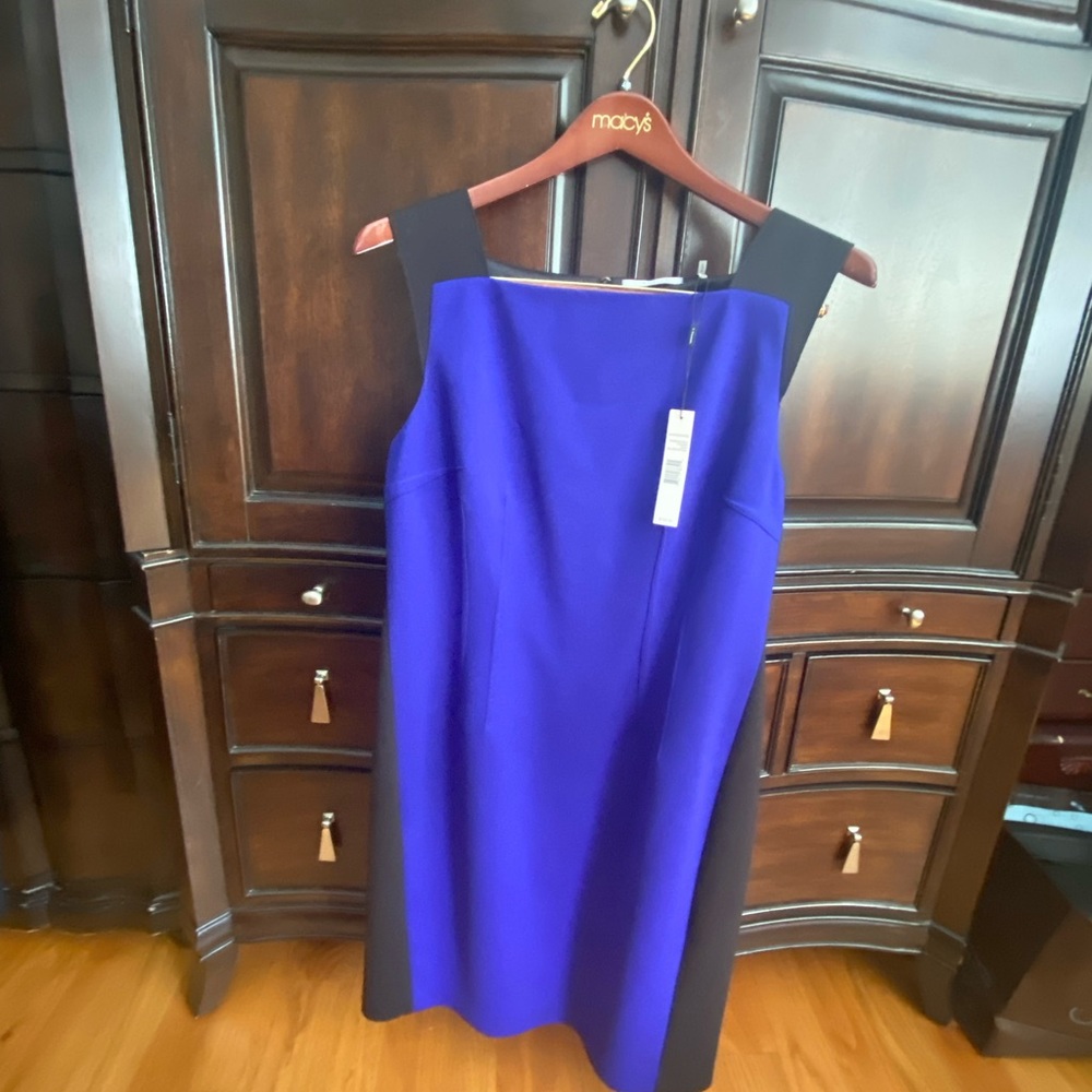 Dress size 14.  Brand new never worn Blue and Black Tahiti  dress. Tags attached